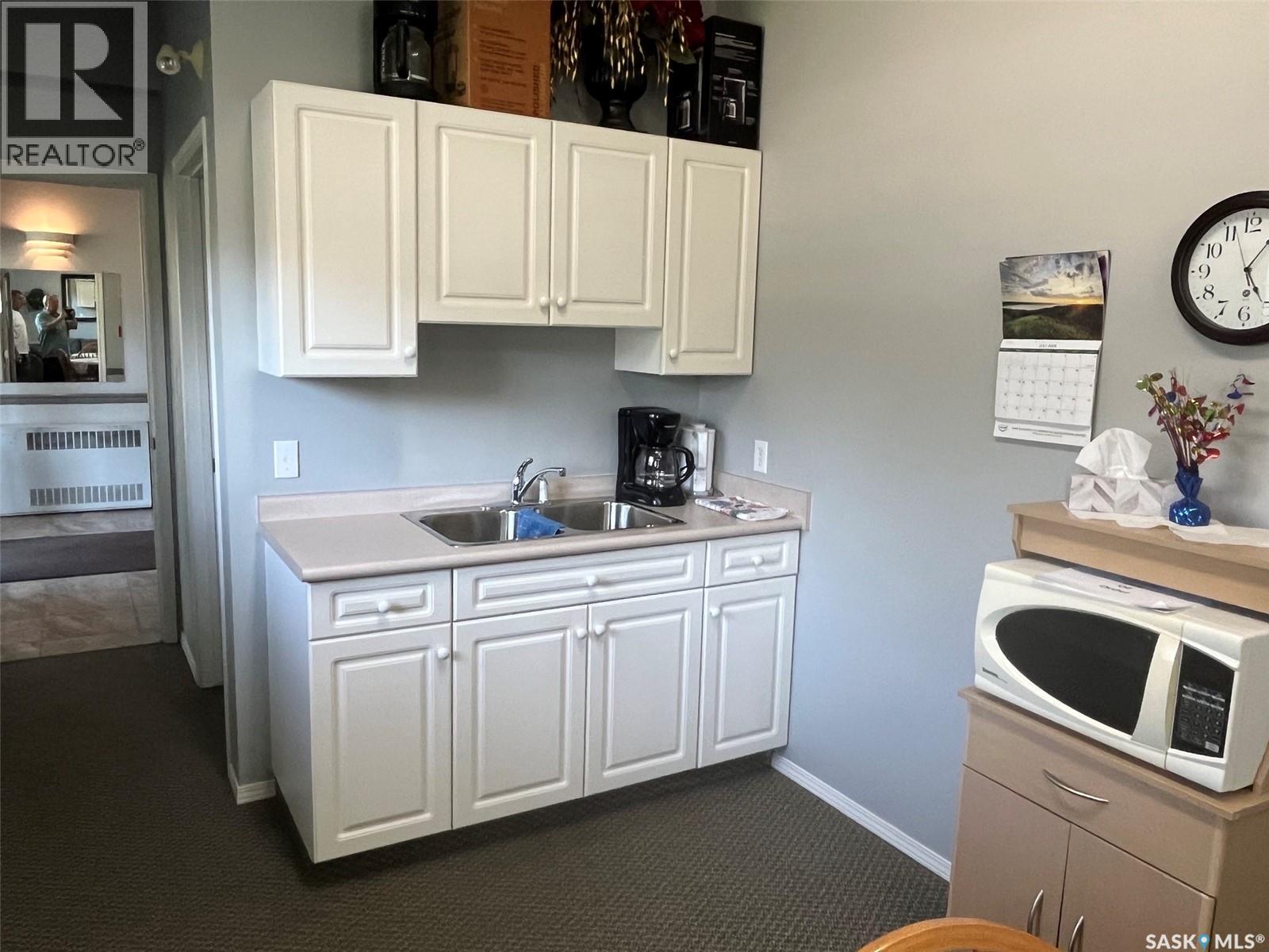 Unit306 1 26Th Street E, Prince Albert, SK - Indoor Photo Showing Kitchen With Double Sink
