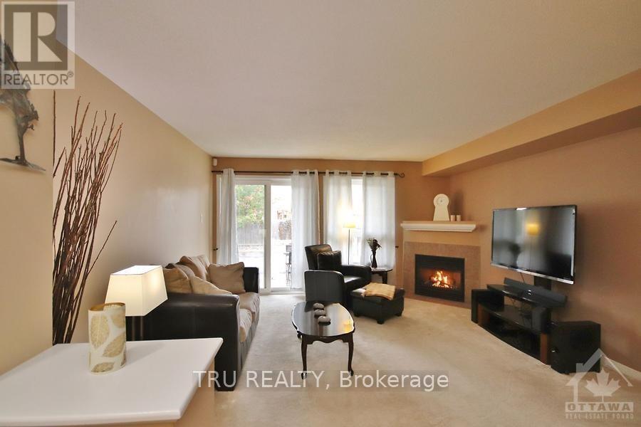 835 Longfields Drive, Ottawa, ON - Indoor Photo Showing Living Room With Fireplace