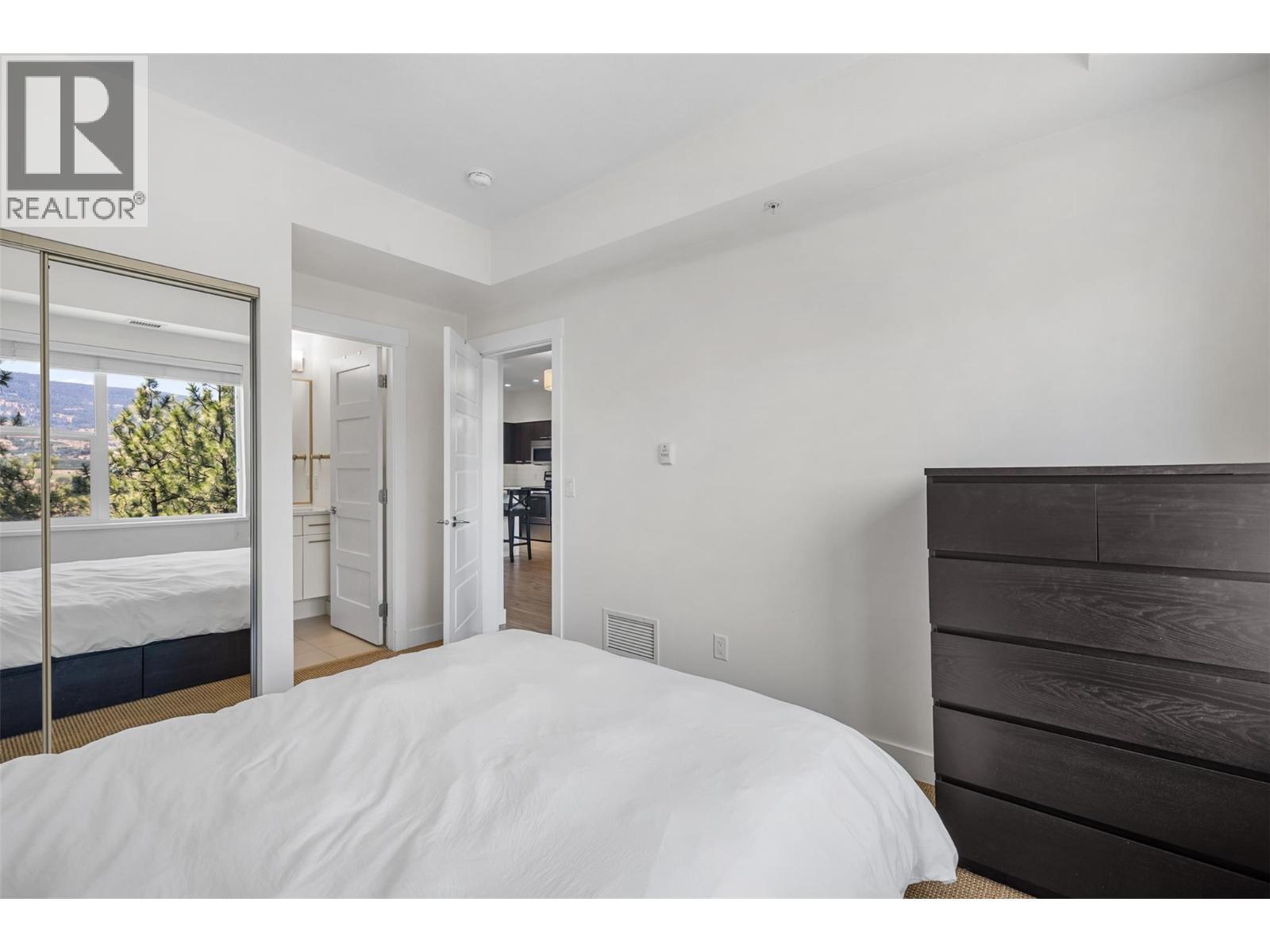 985 Academy Way Unit# 104, Kelowna, BC - Indoor Photo Showing Bedroom