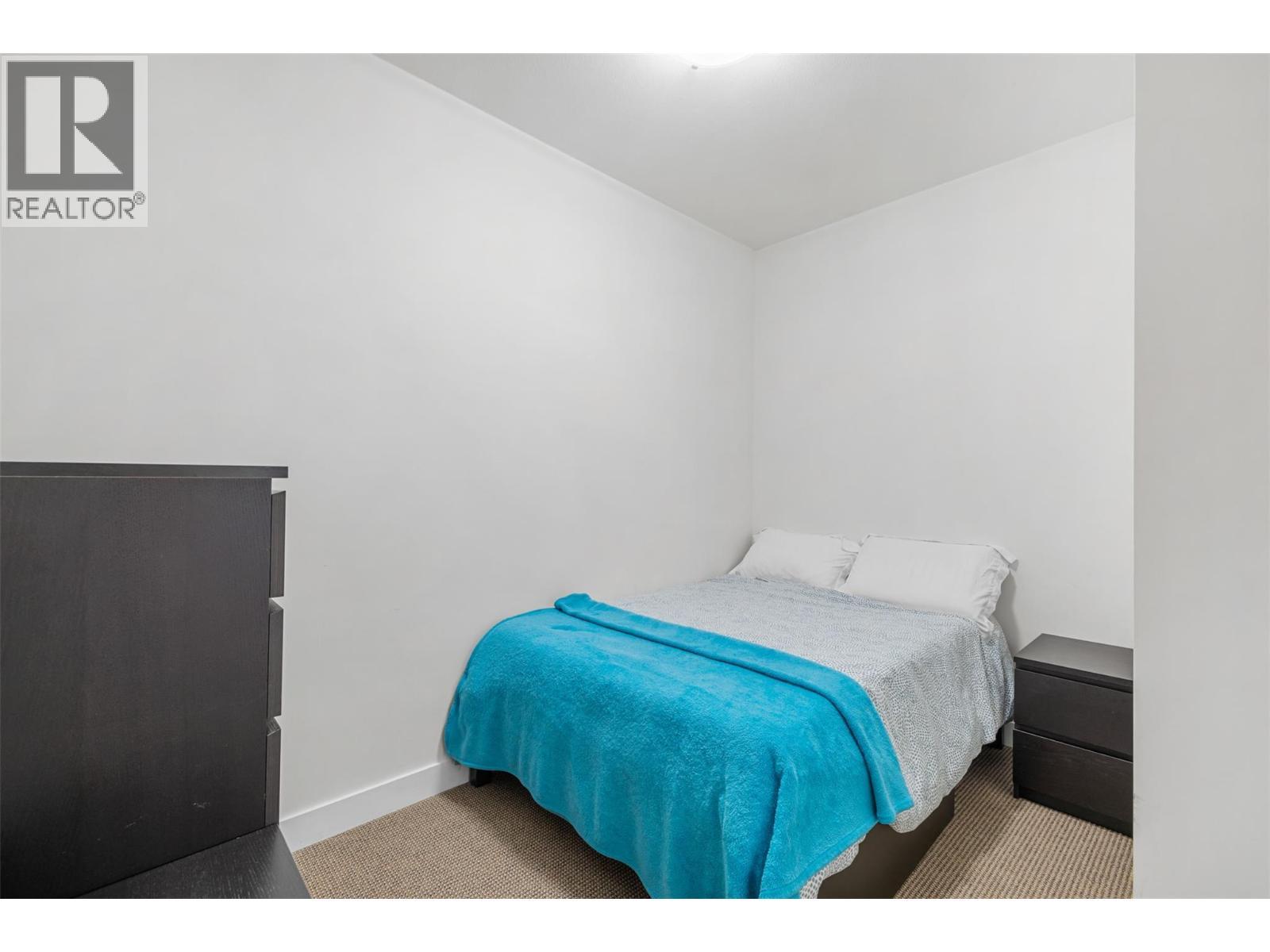 985 Academy Way Unit# 104, Kelowna, BC - Indoor Photo Showing Bedroom