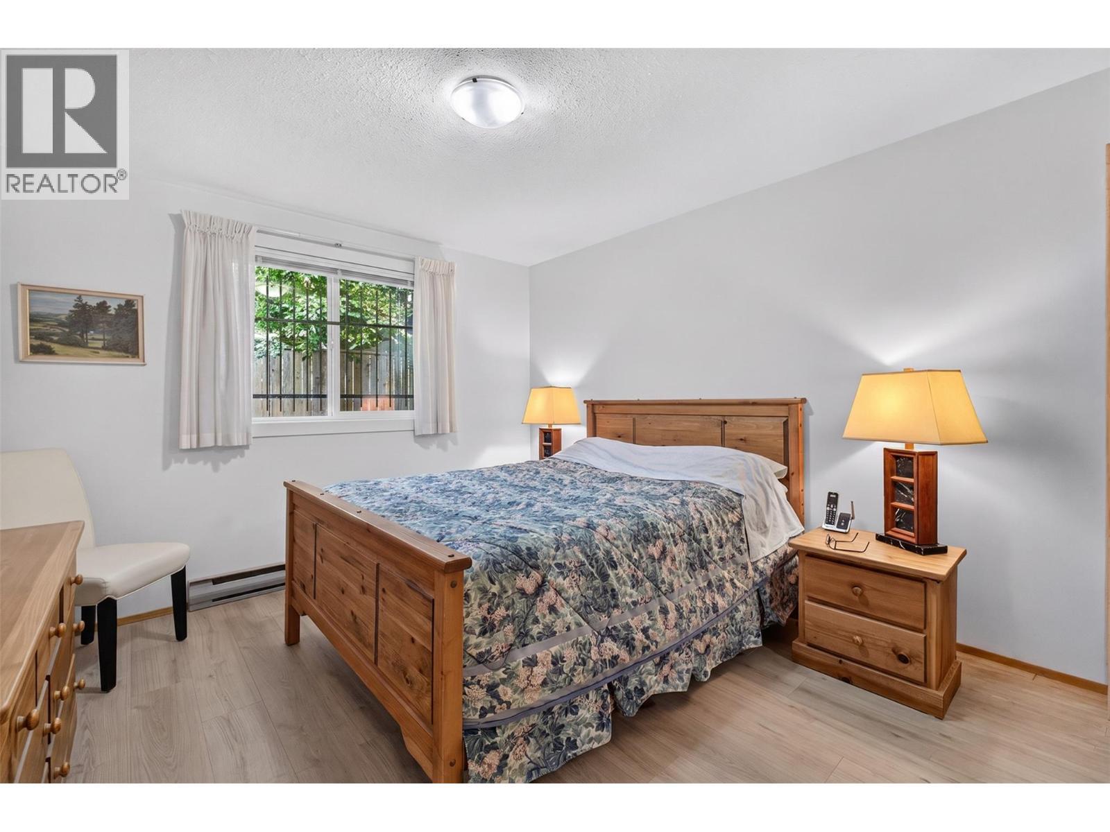 1229 Bernard Avenue Unit# 102, Kelowna, BC - Indoor Photo Showing Bedroom