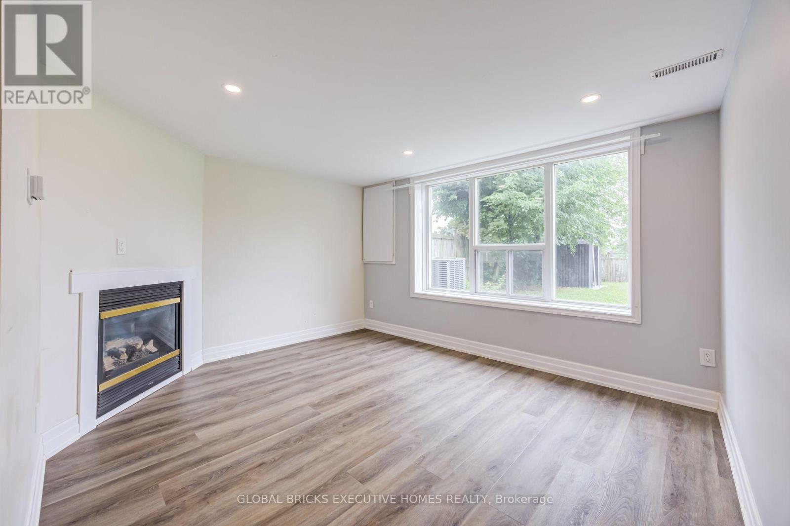 100 Lauris Avenue, Cambridge, ON - Indoor With Fireplace