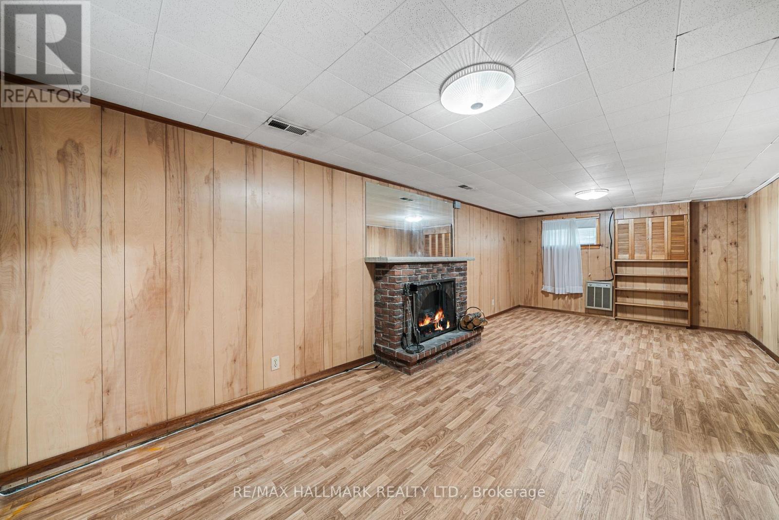 27 Sunray Crescent, Toronto, ON - Indoor Photo Showing Other Room With Fireplace