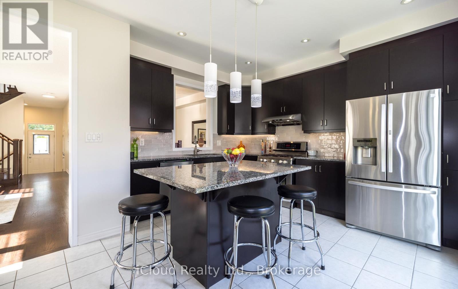 S/S Appliances, Ceramic Floor, Backsplash - 954 Penson Crescent, Milton, ON - Indoor Photo Showing Kitchen With Stainless Steel Kitchen With Upgraded Kitchen