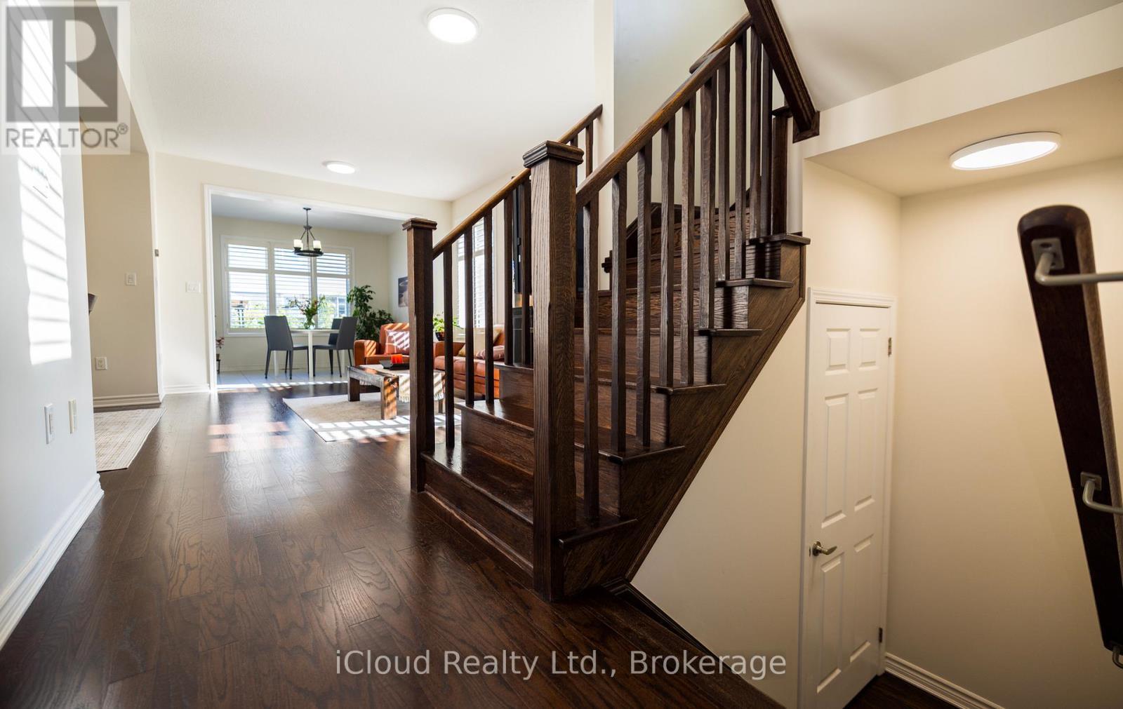 Oak Stairs to Upper lLevel - 954 Penson Crescent, Milton, ON - Indoor Photo Showing Other Room