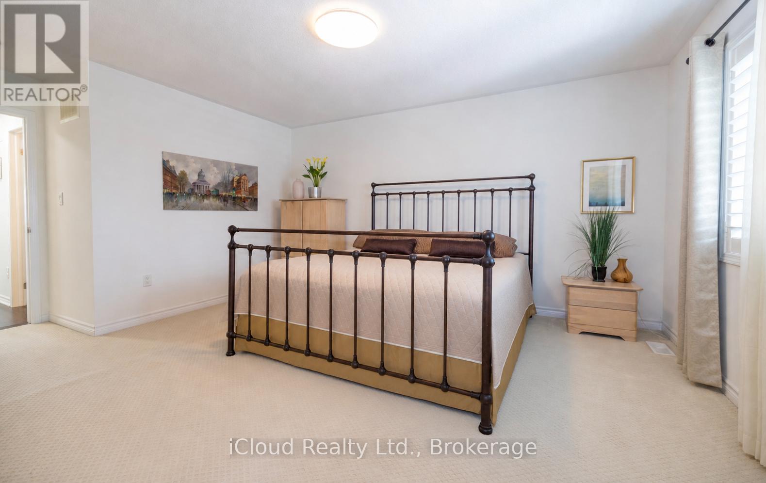 Primary Bedroom With W/I Closet & Ensuite Bathroom - 954 Penson Crescent, Milton, ON - Indoor Photo Showing Other Room