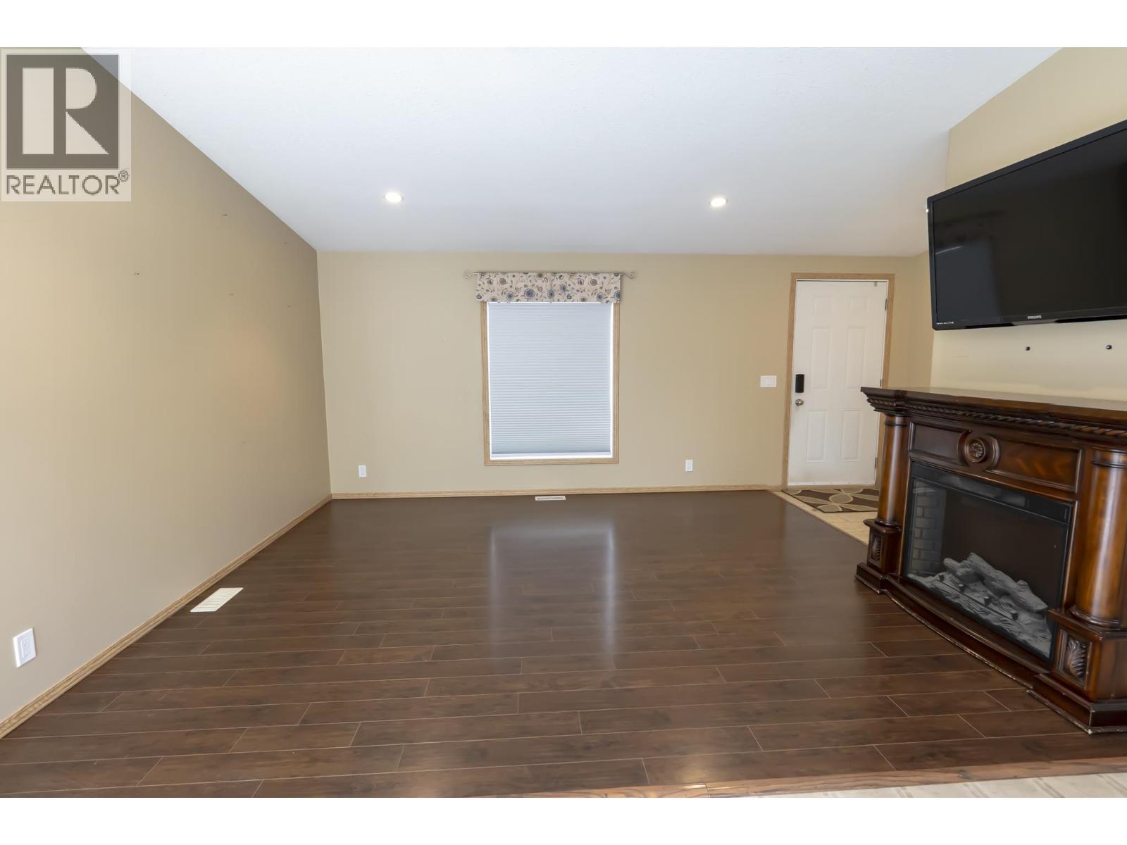 3620 Erickson Road, Vanderhoof, BC - Indoor Photo Showing Other Room With Fireplace
