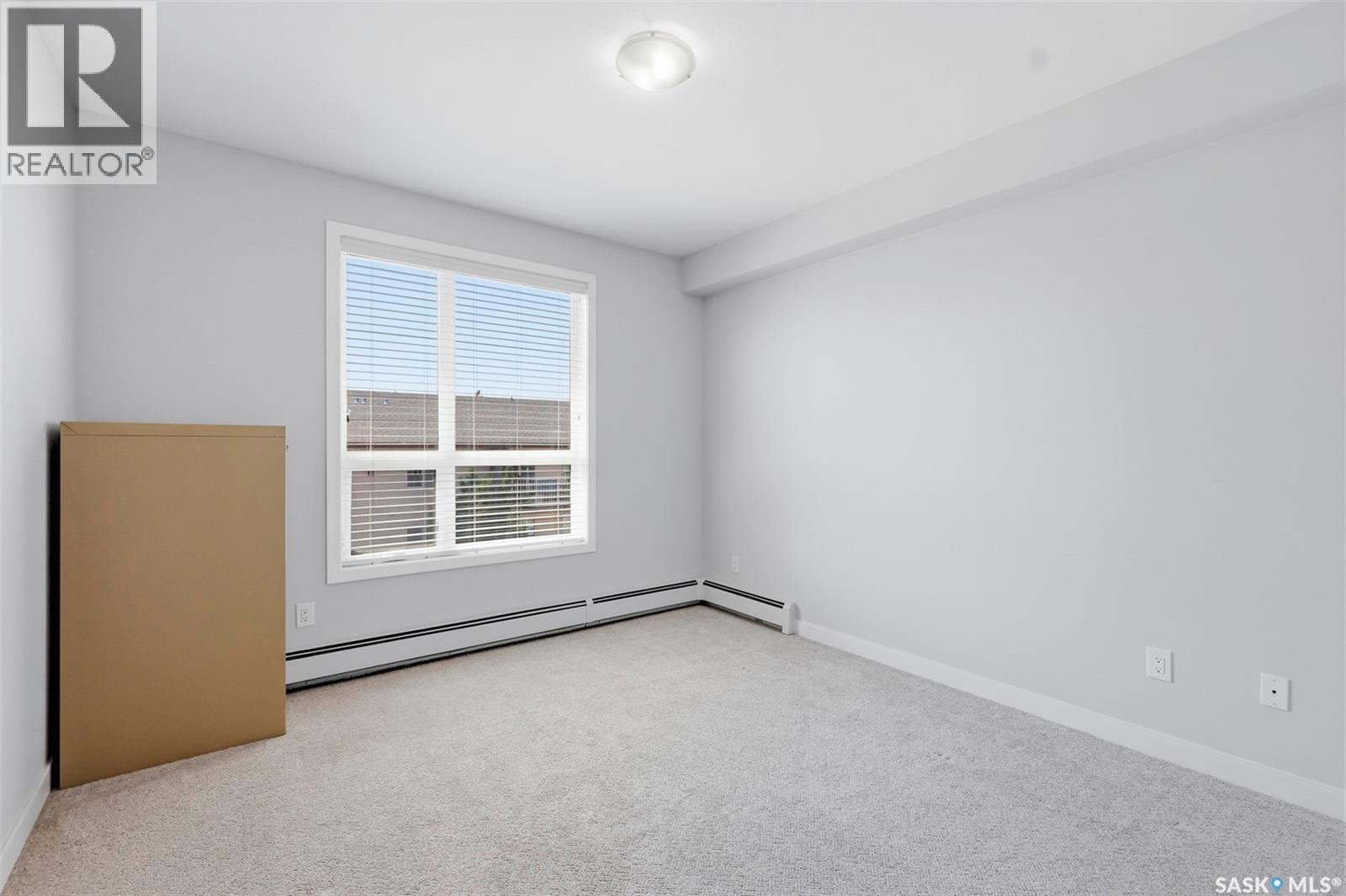 310 1025 Moss Avenue, Saskatoon, SK - Indoor Photo Showing Other Room