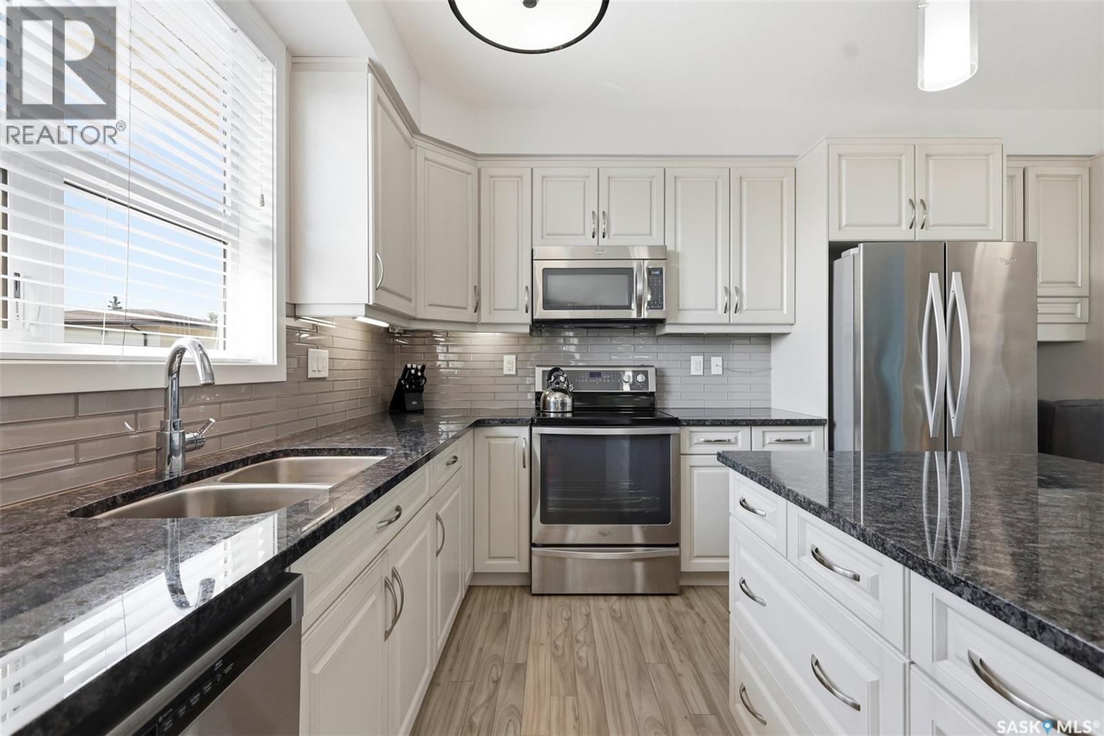 310 1025 Moss Avenue, Saskatoon, SK - Indoor Photo Showing Kitchen With Double Sink With Upgraded Kitchen