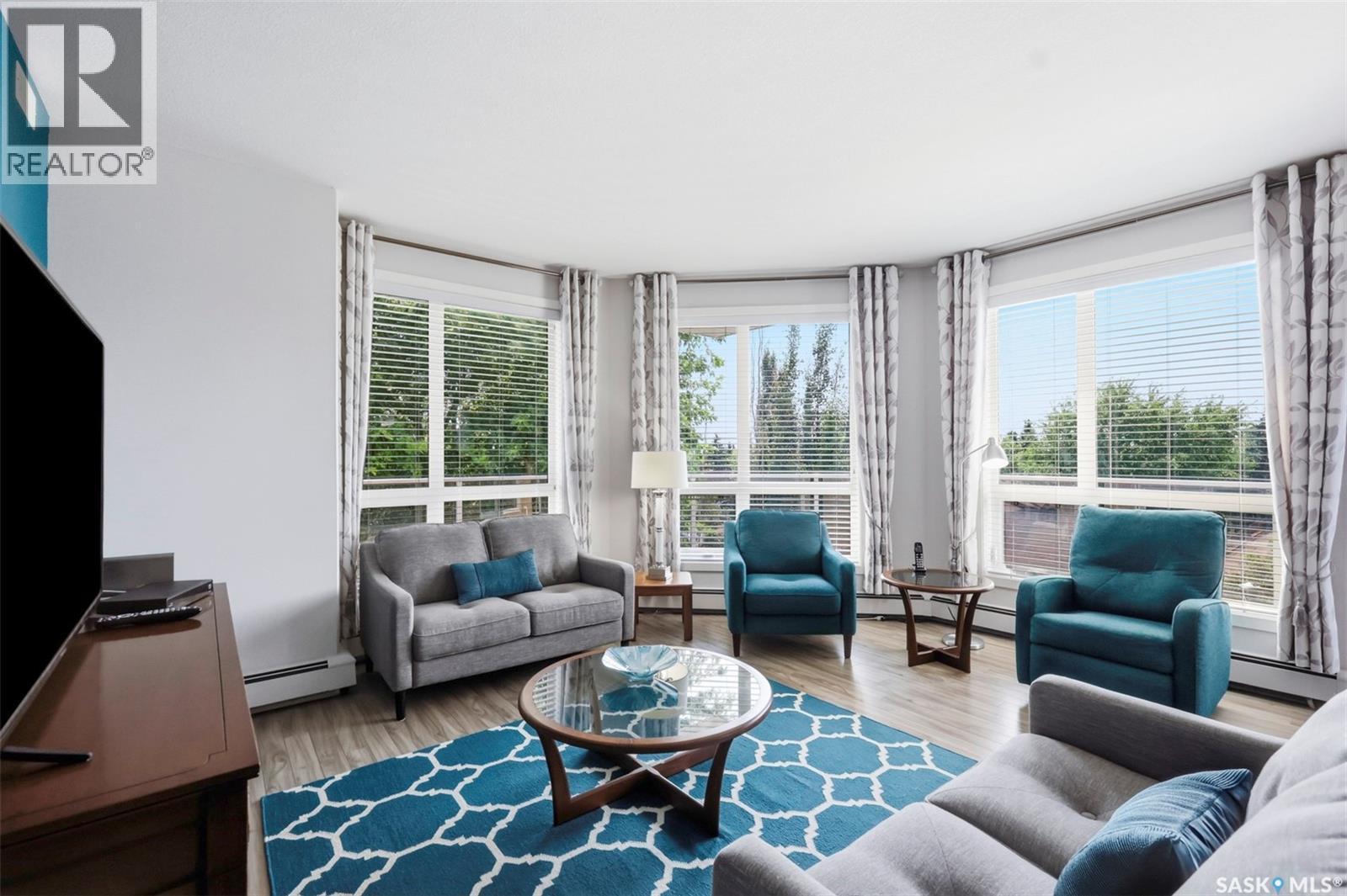 310 1025 Moss Avenue, Saskatoon, SK - Indoor Photo Showing Living Room