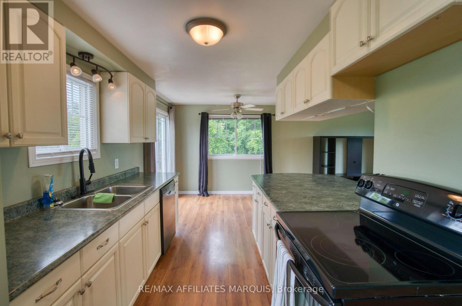 3826 Big Rideau Lake Road, Rideau Lakes, ON - Indoor Photo Showing Kitchen With Double Sink