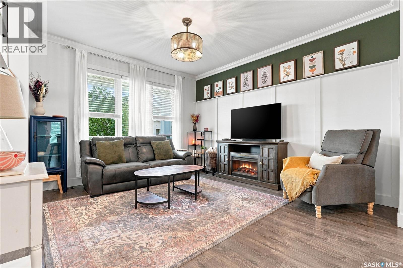 431 Eaton Lane, Saskatoon, SK - Indoor Photo Showing Living Room With Fireplace