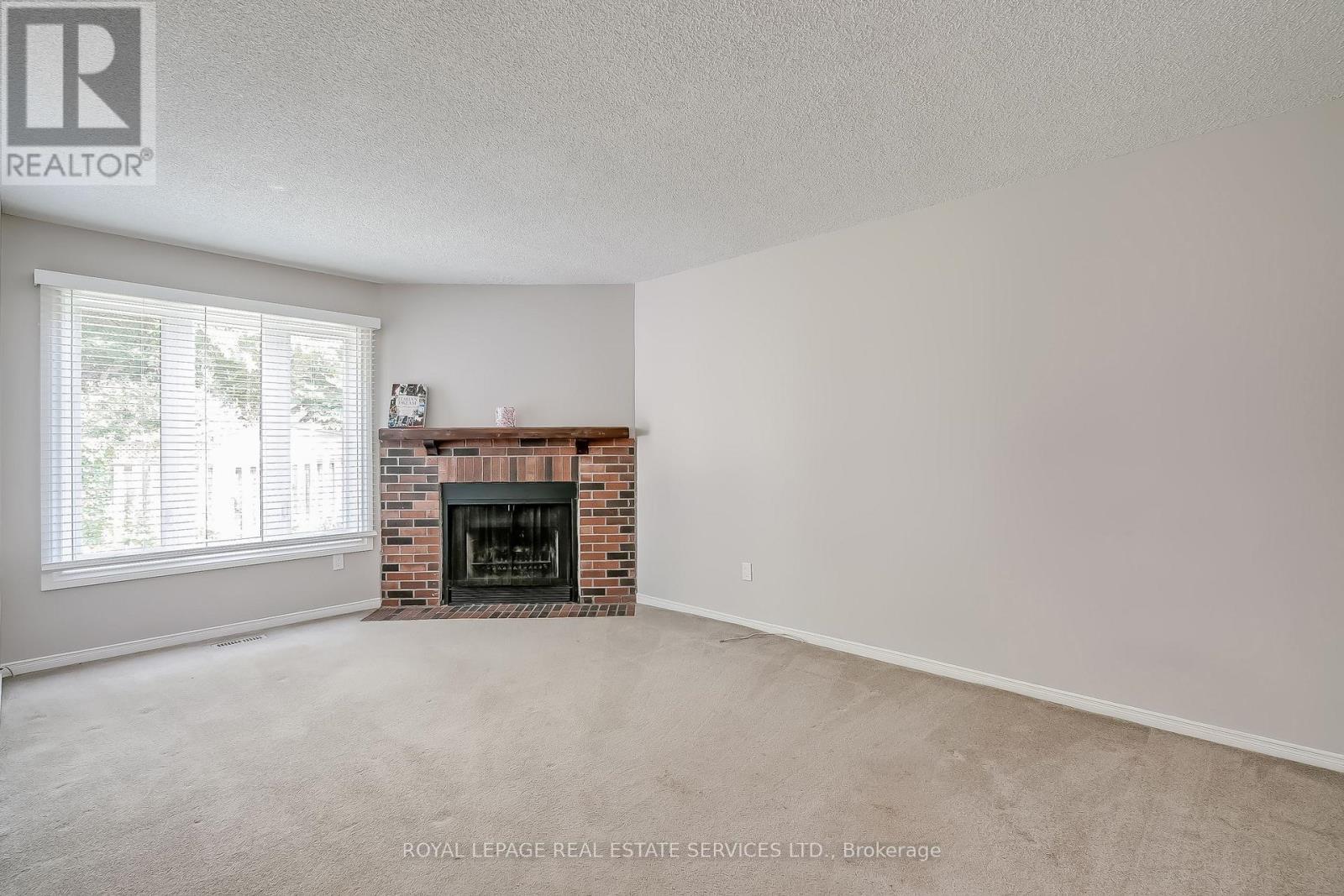 265 Mississaga Street, Oakville, ON - Indoor Photo Showing Living Room With Fireplace