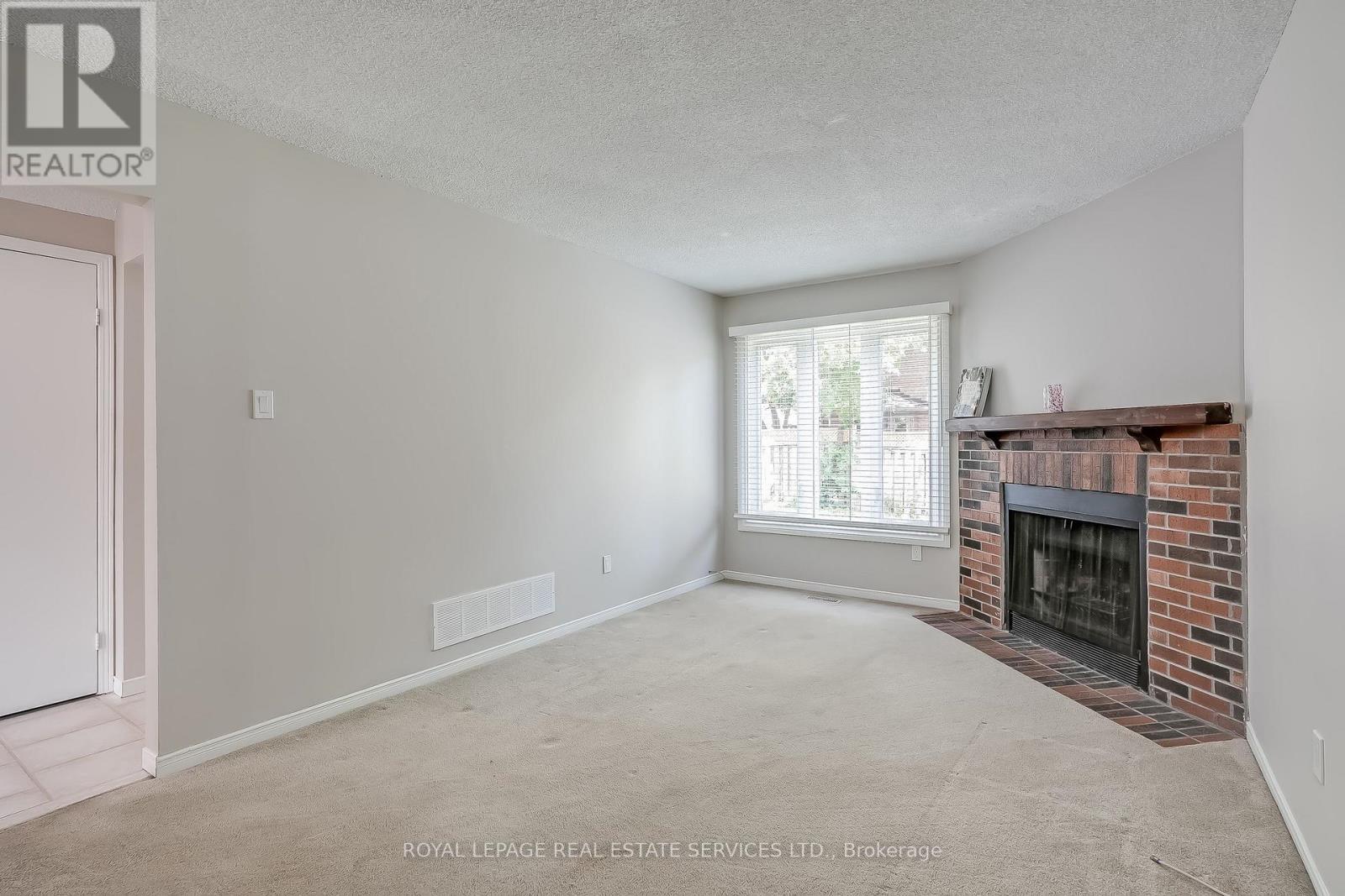 265 Mississaga Street, Oakville, ON - Indoor Photo Showing Living Room With Fireplace