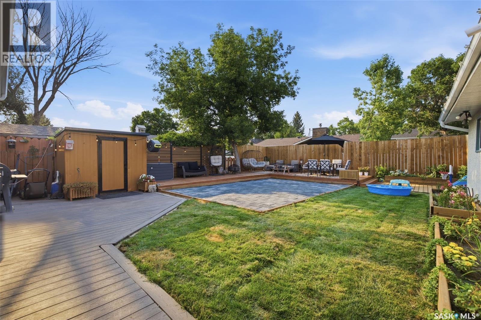 98 Dunsmore Drive, Regina, SK - Outdoor With Backyard