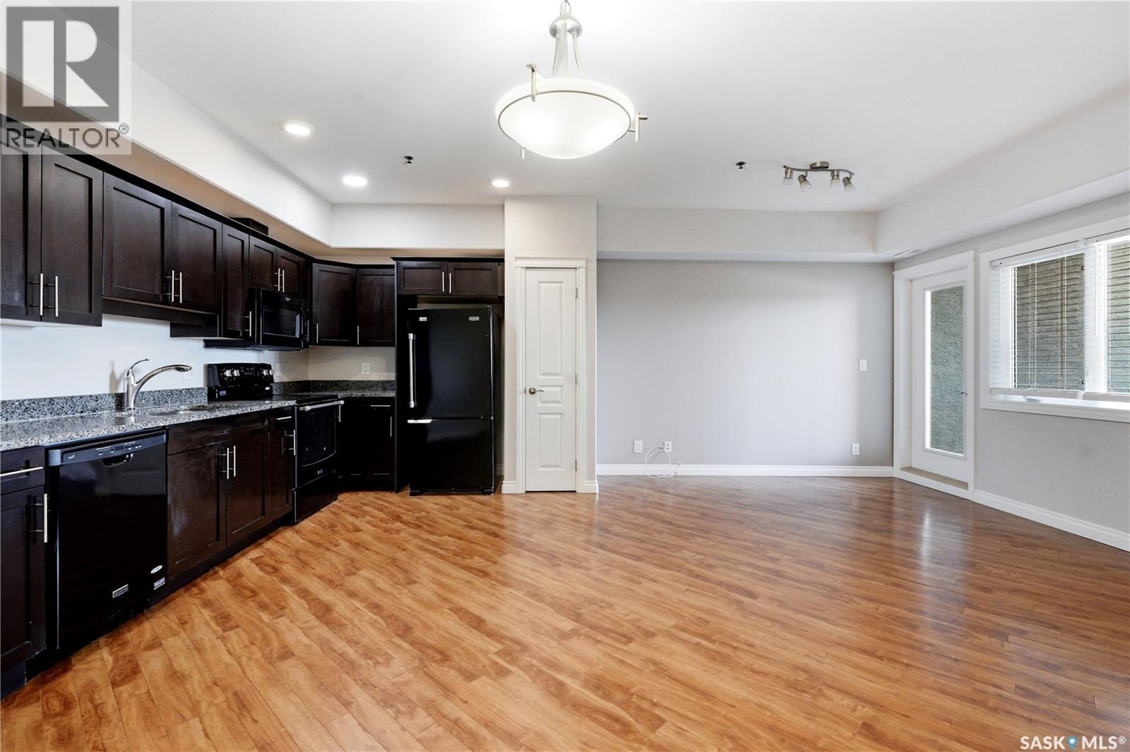 213 412 Willowgrove Square, Saskatoon, SK - Indoor Photo Showing Kitchen With Double Sink
