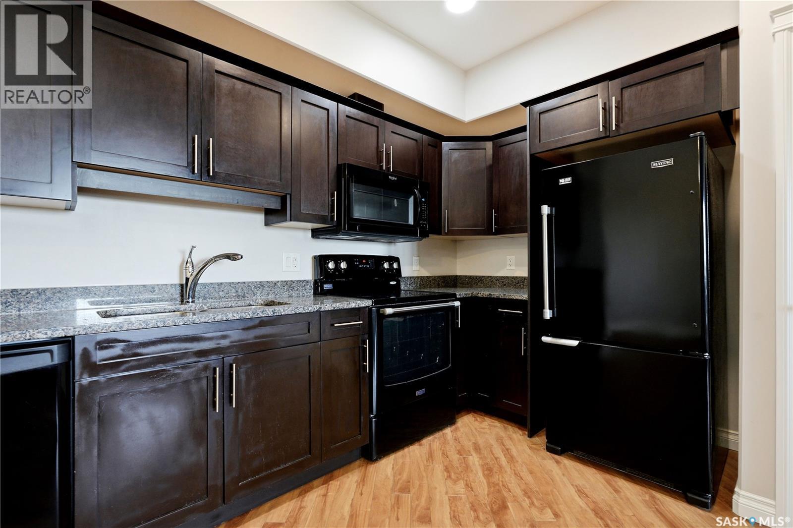 213 412 Willowgrove Square, Saskatoon, SK - Indoor Photo Showing Kitchen With Double Sink