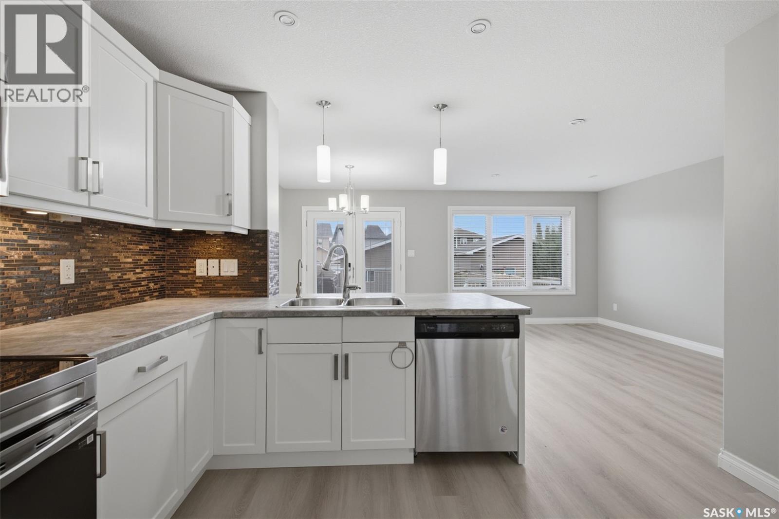 4845 Liberty Street, Regina, SK - Indoor Photo Showing Kitchen With Double Sink With Upgraded Kitchen