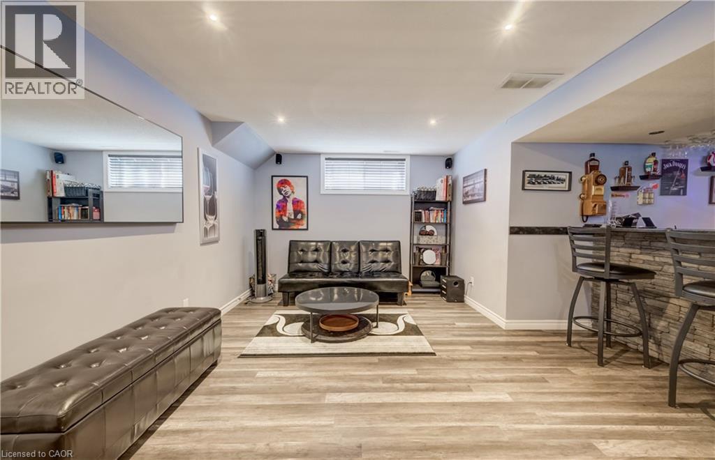 expansive rec room - 521 Snowdrop Court, Kitchener, ON - Indoor Photo Showing Basement