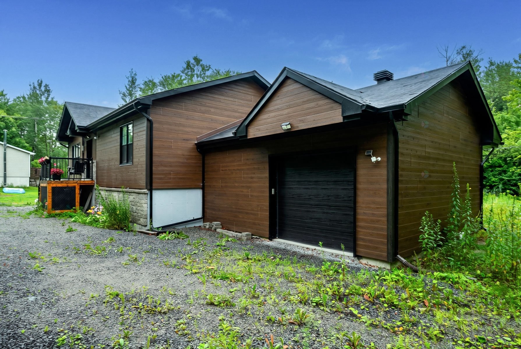 Garage - 110 Rue Philipon, Saint-Calixte, QC - Outdoor With Exterior