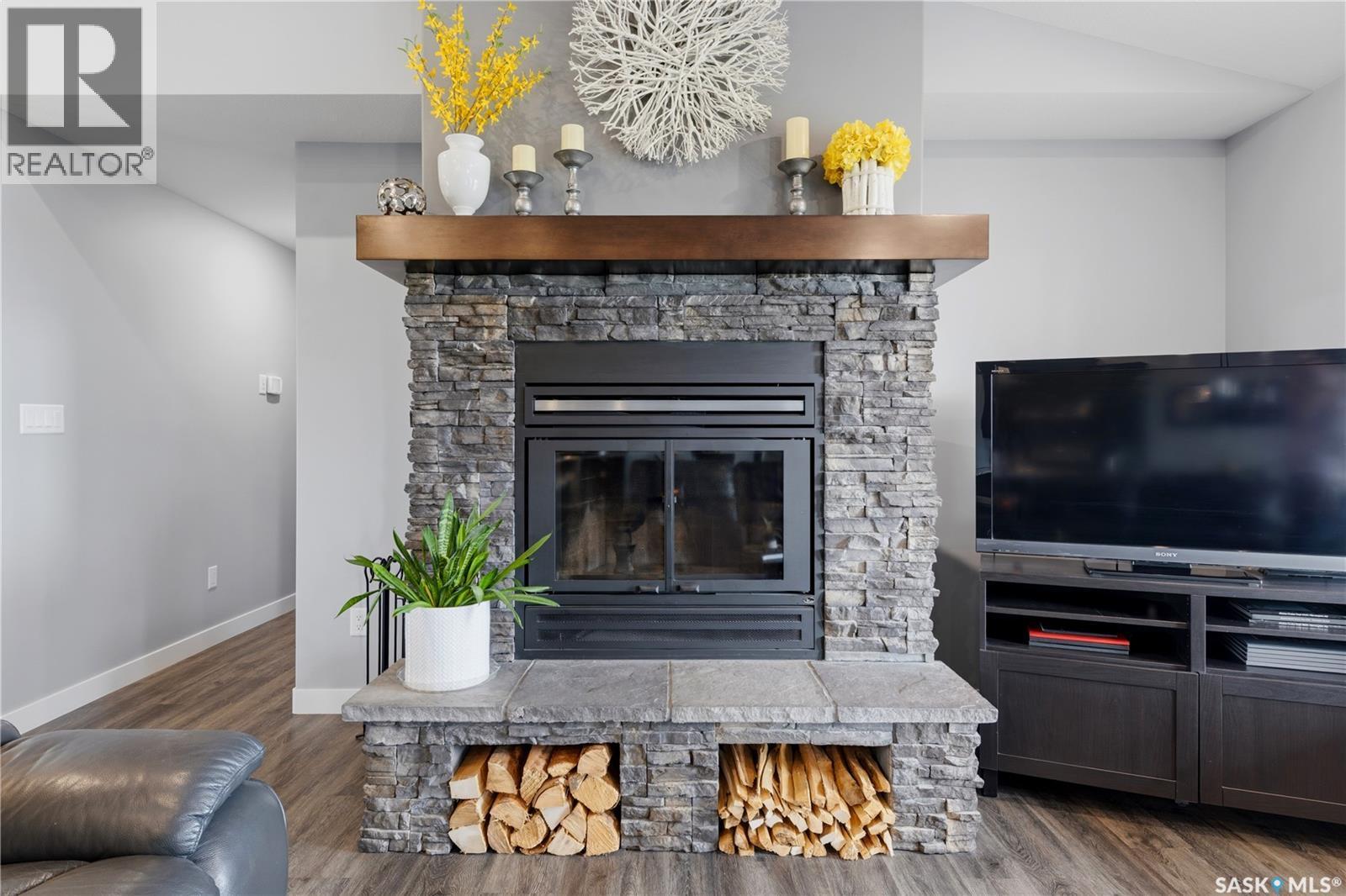 12 Valley Ridge Road, Last Mountain Lake, SK - Indoor Photo Showing Living Room With Fireplace