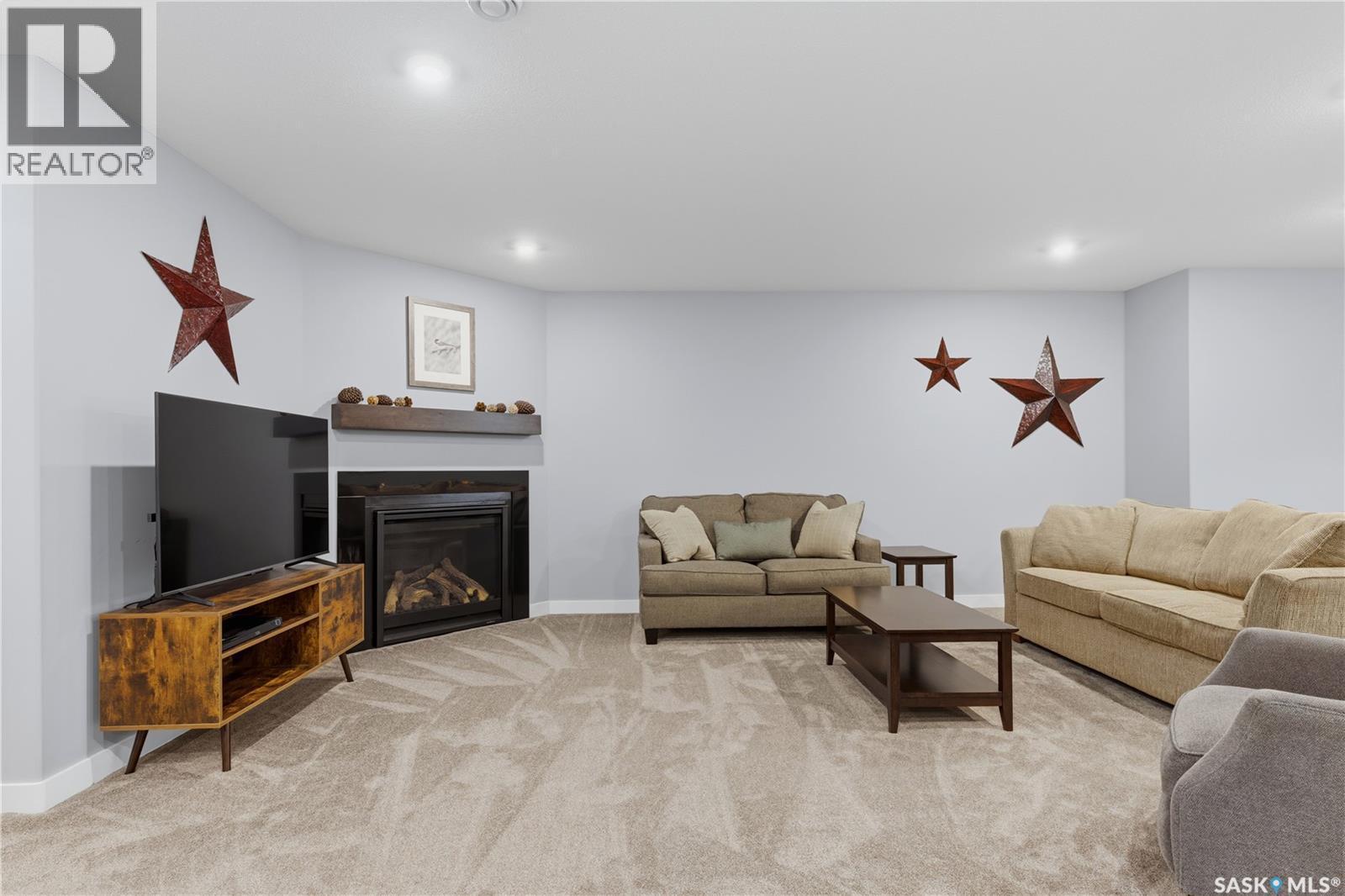 12 Valley Ridge Road, Last Mountain Lake, SK - Indoor With Fireplace