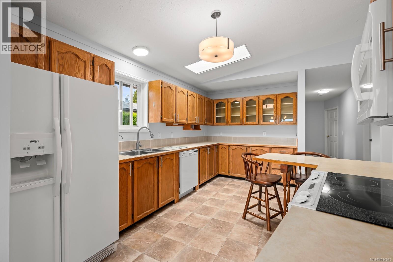 2233 6Th St E, Courtenay, BC - Indoor Photo Showing Kitchen With Double Sink