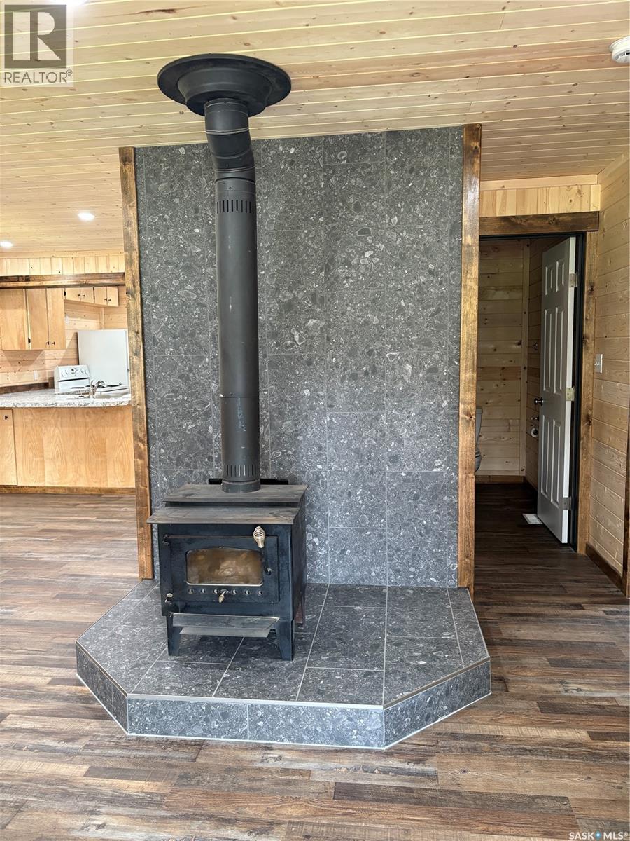 Thompson Acreage, Canwood Rm No. 494, SK - Indoor Photo Showing Other Room With Fireplace