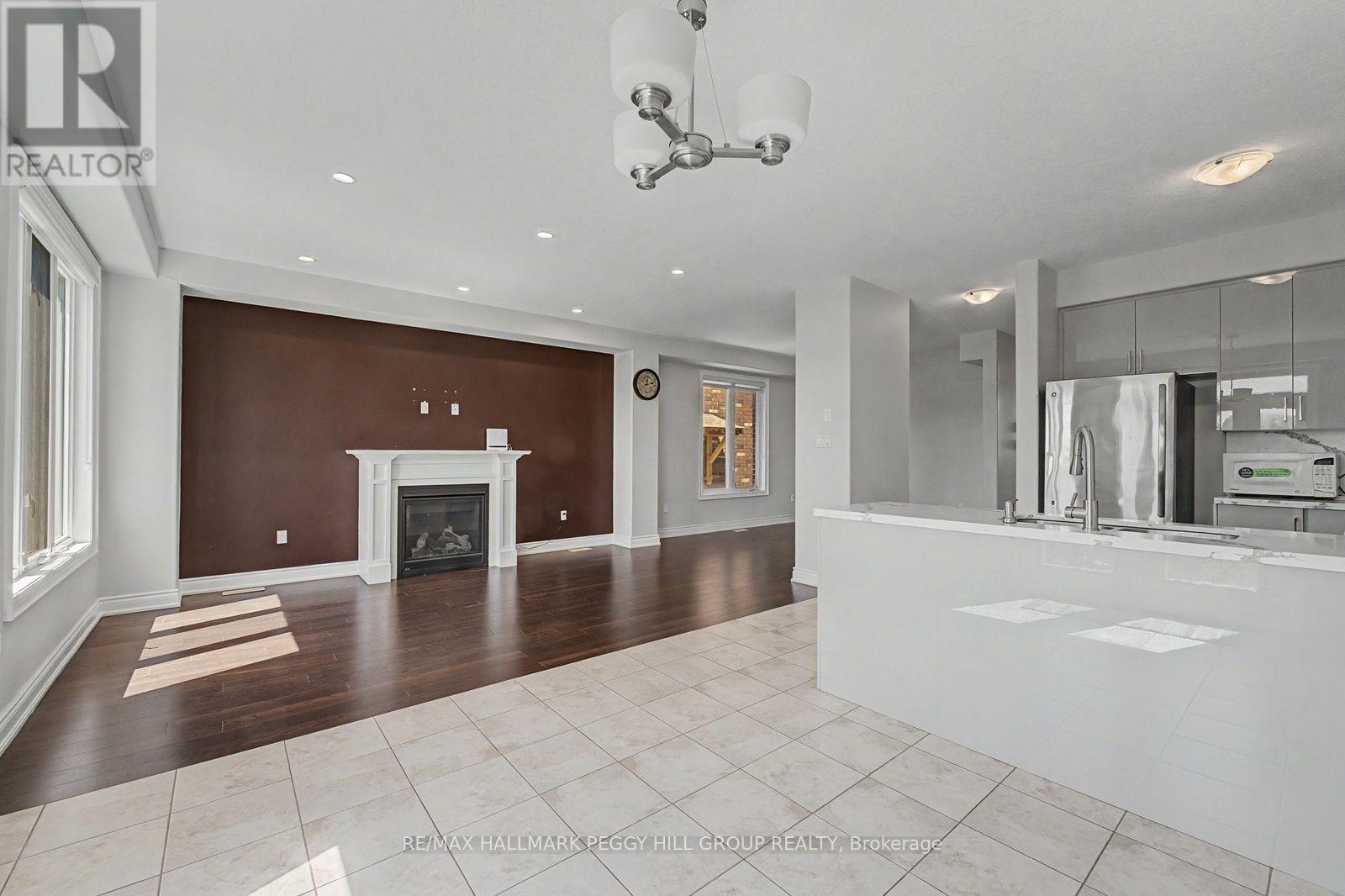 Upper - 53 Nathan Crescent, Barrie, ON - Indoor With Fireplace