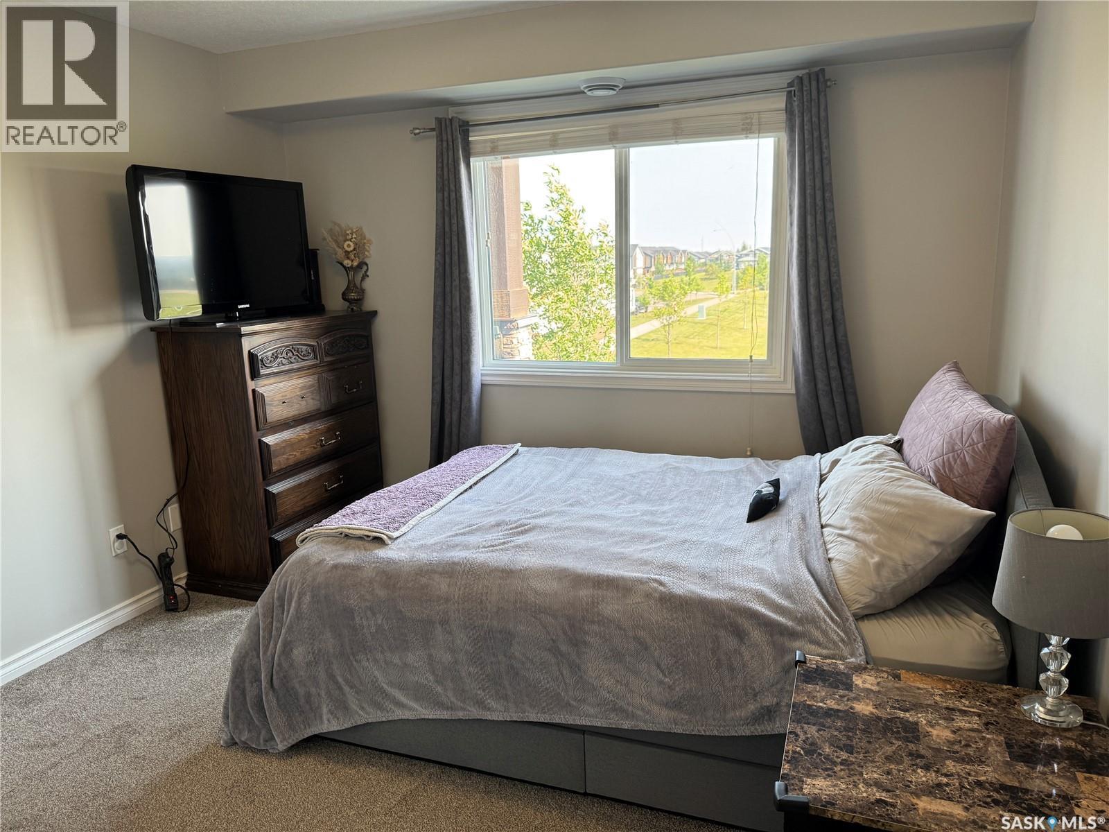 108 210 Rajput Way, Saskatoon, SK - Indoor Photo Showing Bedroom