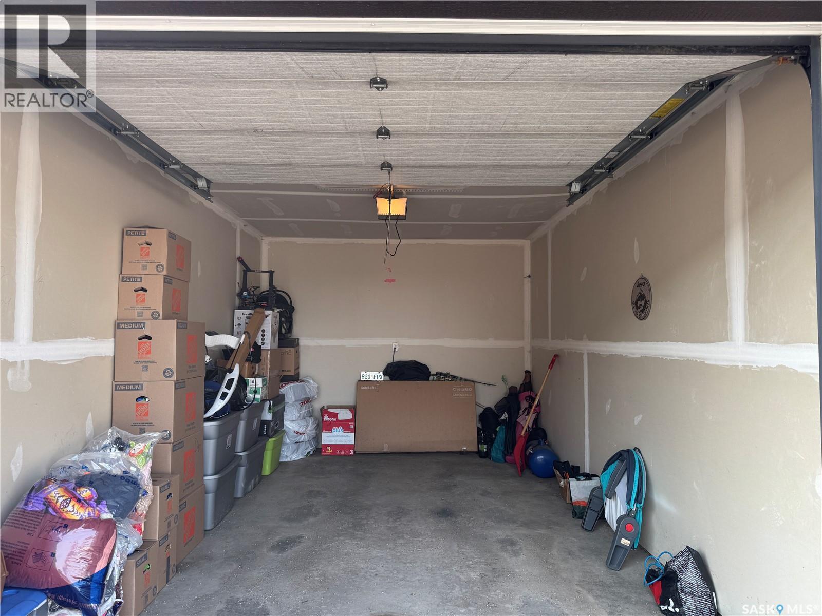108 210 Rajput Way, Saskatoon, SK - Indoor Photo Showing Garage