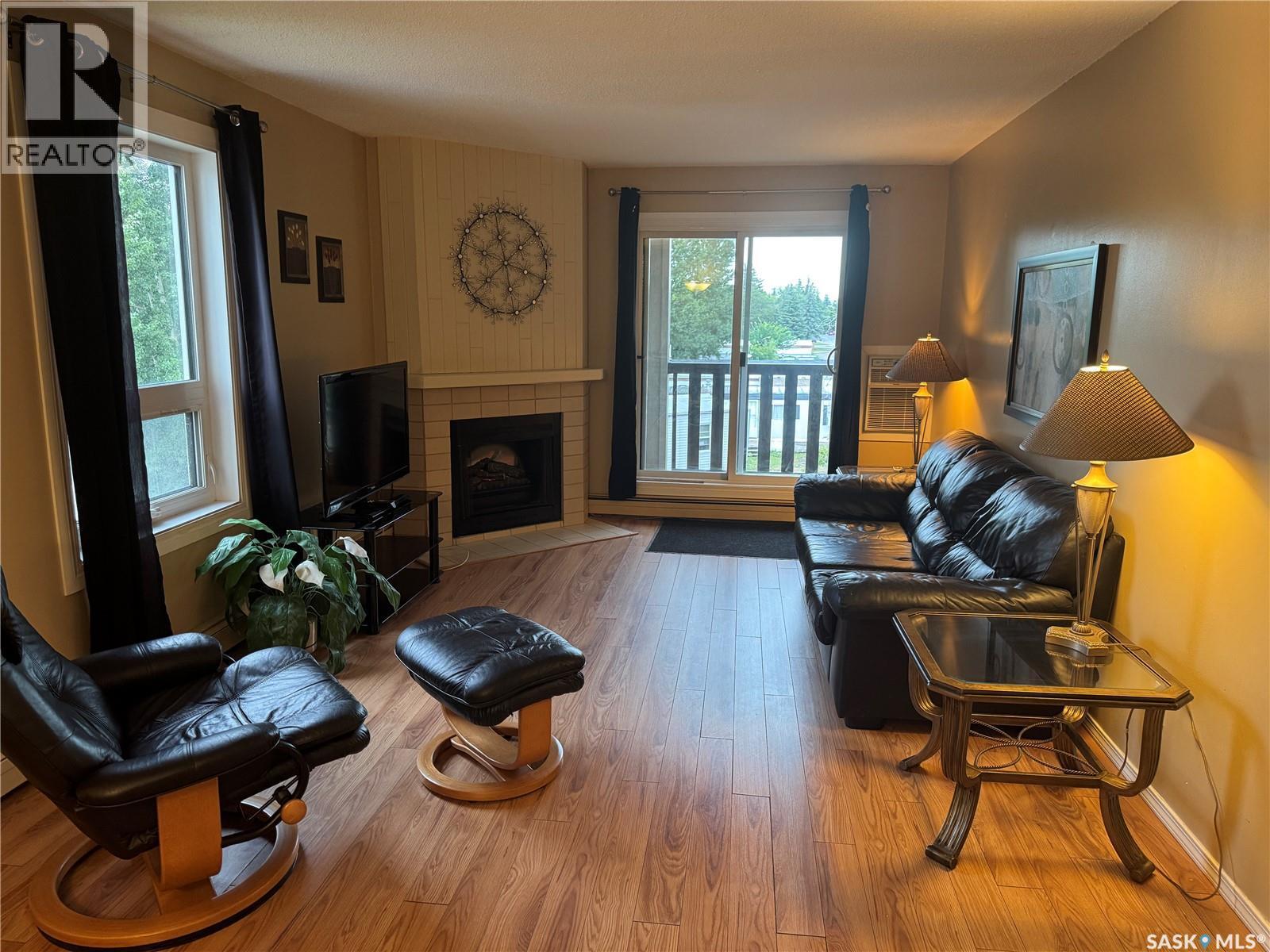 237 510 Prairie Avenue, Saskatoon, SK - Indoor Photo Showing Living Room With Fireplace