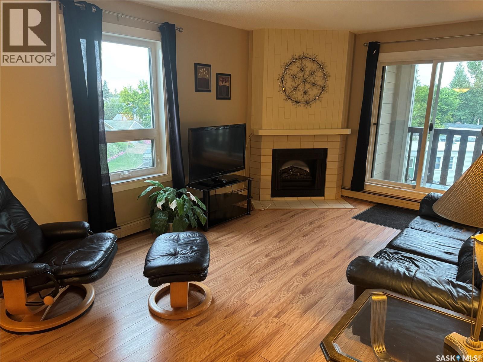 237 510 Prairie Avenue, Saskatoon, SK - Indoor Photo Showing Living Room With Fireplace