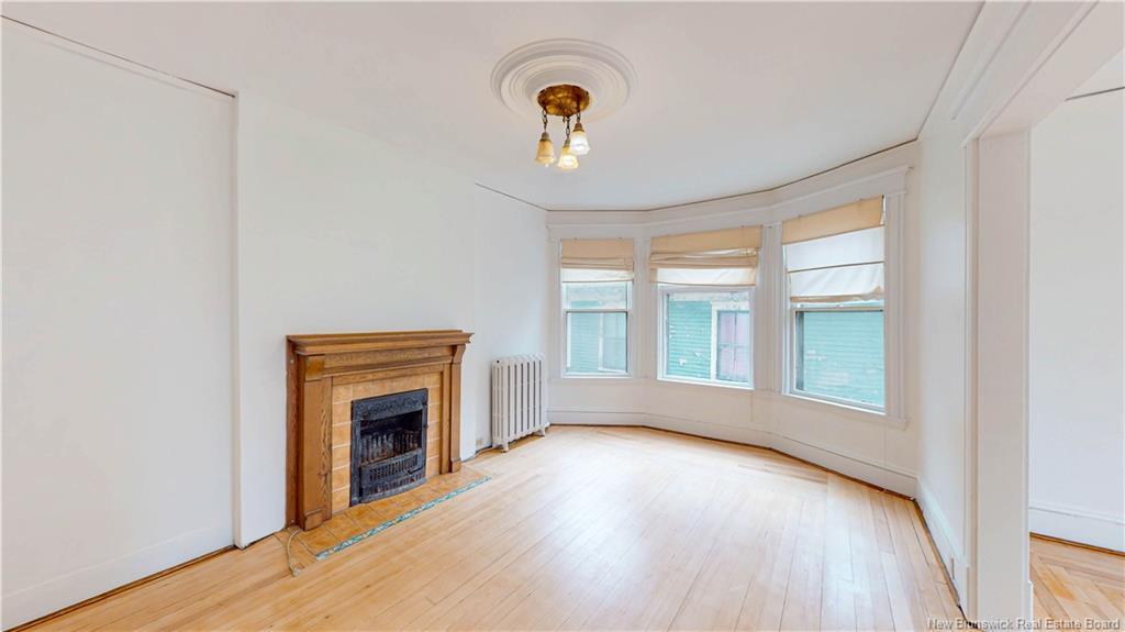 69-71 Clarendon, Saint John, NB - Indoor Photo Showing Living Room With Fireplace