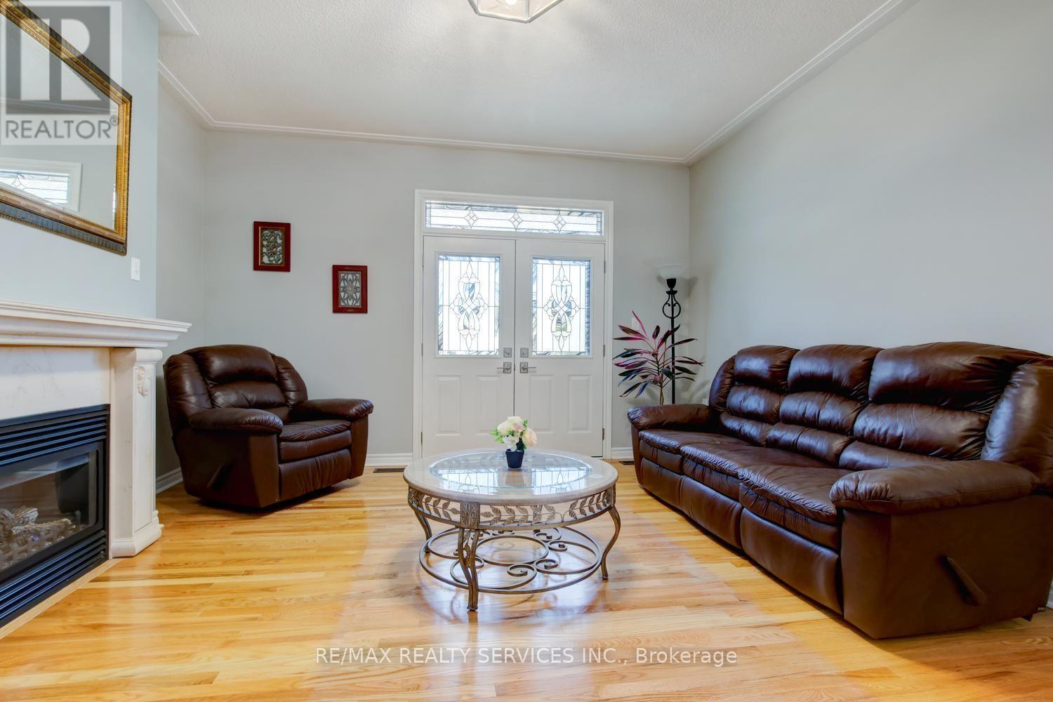35 Hardgate Crescent, Brampton, ON - Indoor Photo Showing Living Room With Fireplace