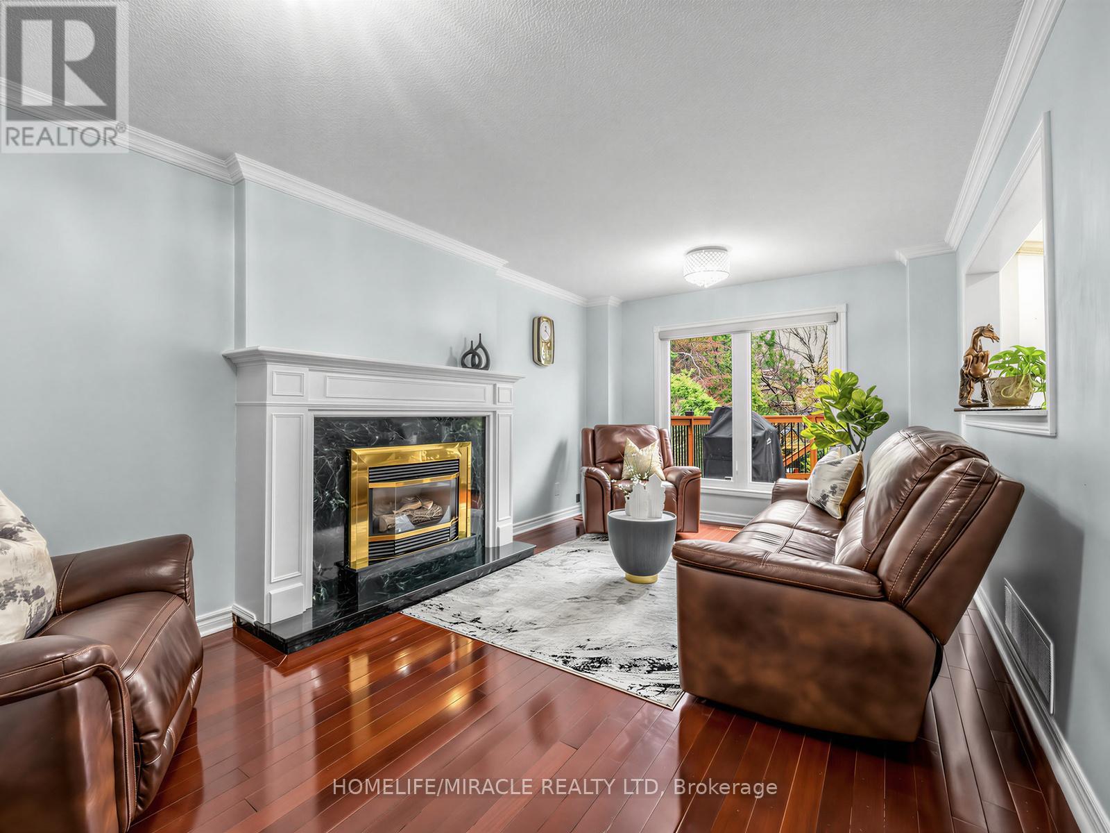 2023 Jacamar Court, Mississauga, ON - Indoor Photo Showing Living Room With Fireplace