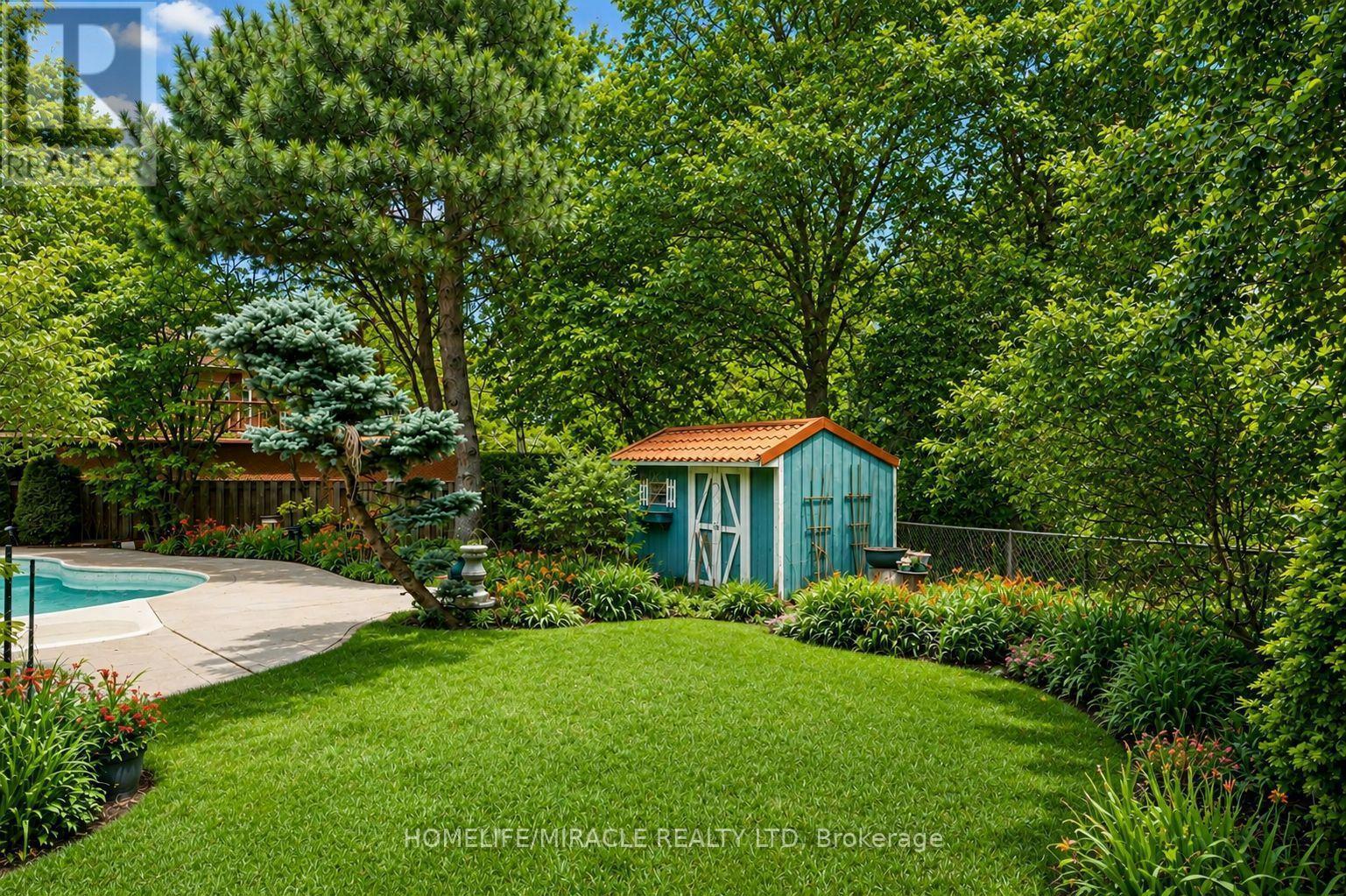 2023 Jacamar Court, Mississauga, ON - Outdoor With In Ground Pool