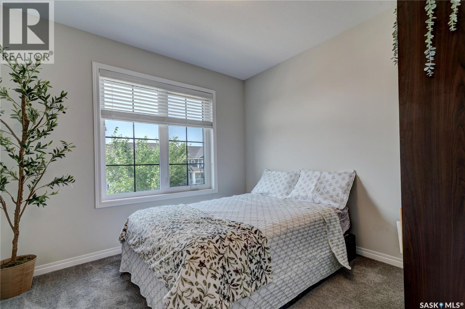 3277 Chuka Boulevard, Regina, SK - Indoor Photo Showing Bedroom