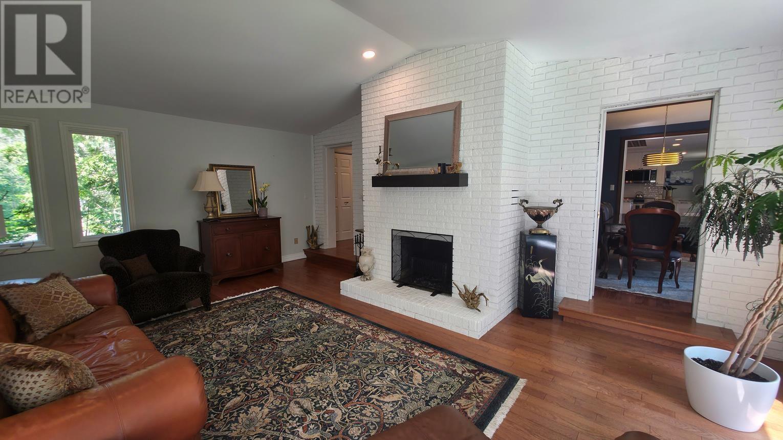 823 Fourth Lin E, Sault Ste. Marie, ON - Indoor Photo Showing Living Room With Fireplace