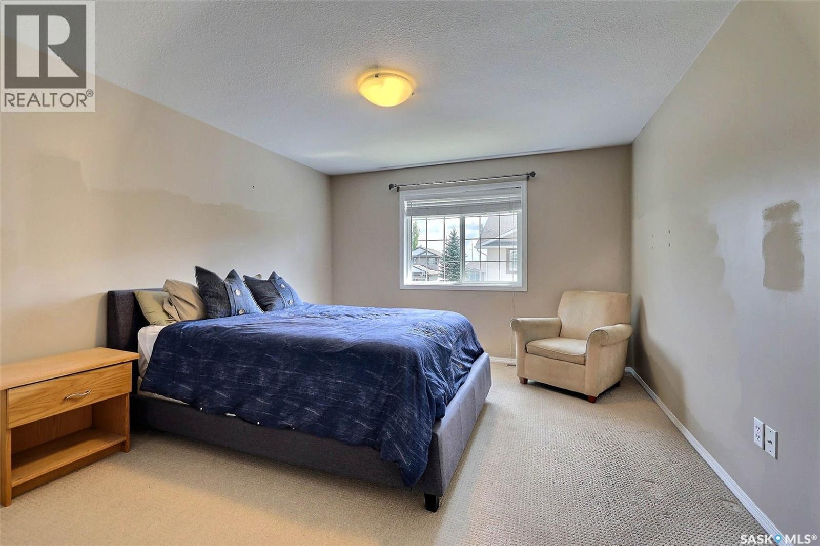 53 4425 Nicurity Drive, Regina, SK - Indoor Photo Showing Bedroom