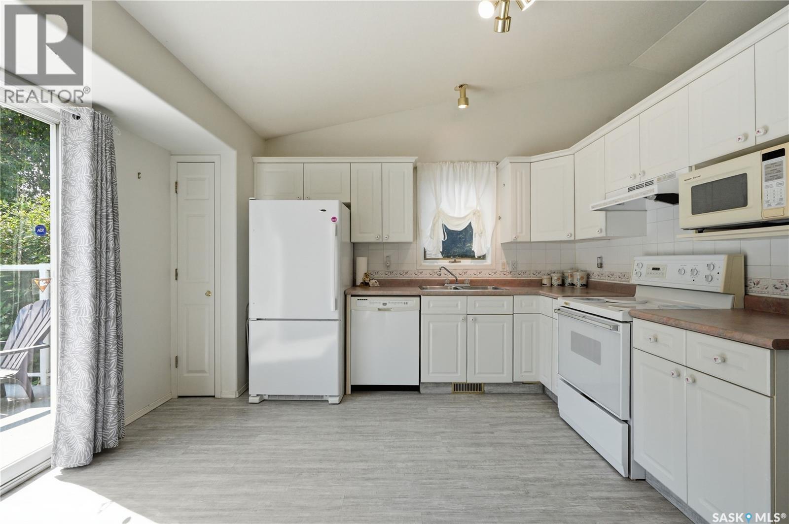 502 Scissons Crescent, Saskatoon, SK - Indoor Photo Showing Kitchen With Double Sink