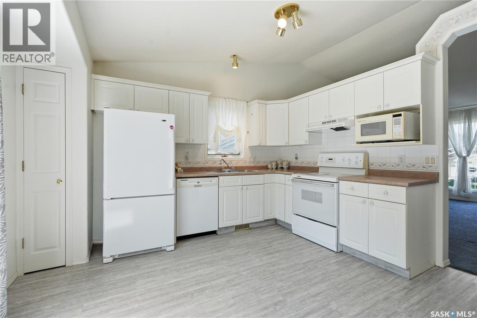 502 Scissons Crescent, Saskatoon, SK - Indoor Photo Showing Kitchen With Double Sink
