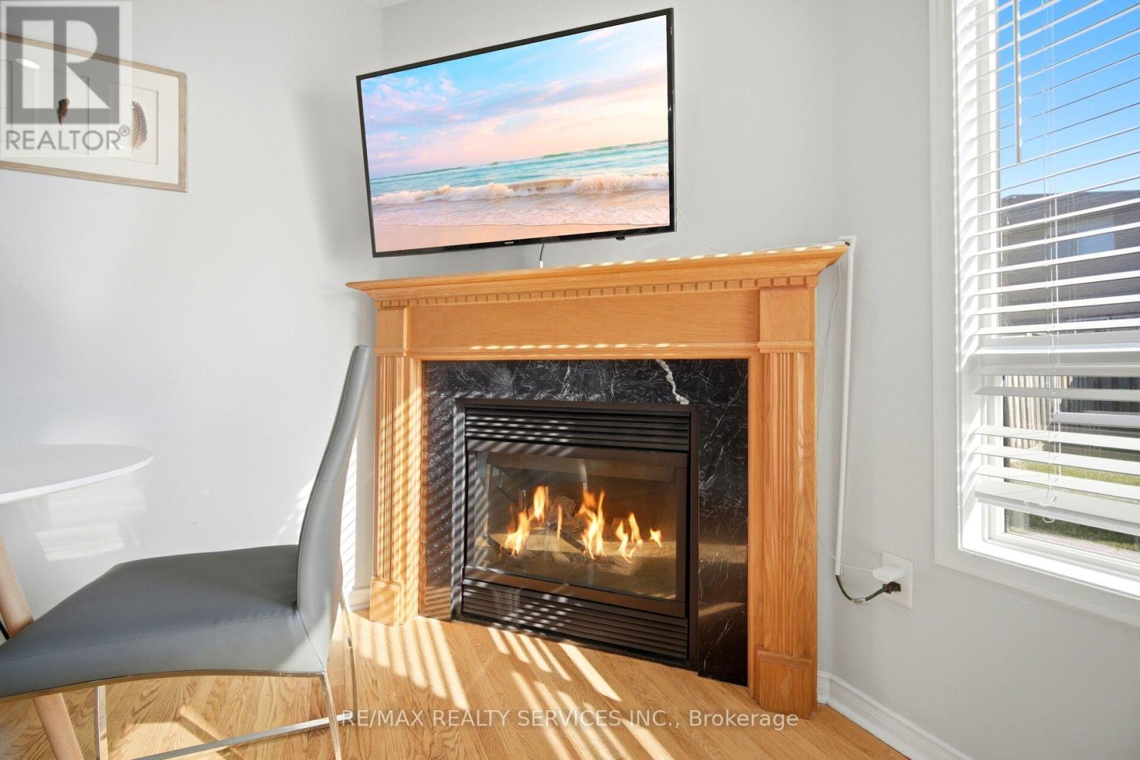 29 Lonestar Crescent, Brampton, ON - Indoor Photo Showing Living Room With Fireplace