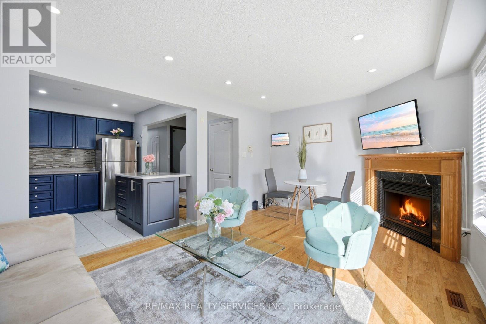 29 Lonestar Crescent, Brampton, ON - Indoor Photo Showing Living Room With Fireplace