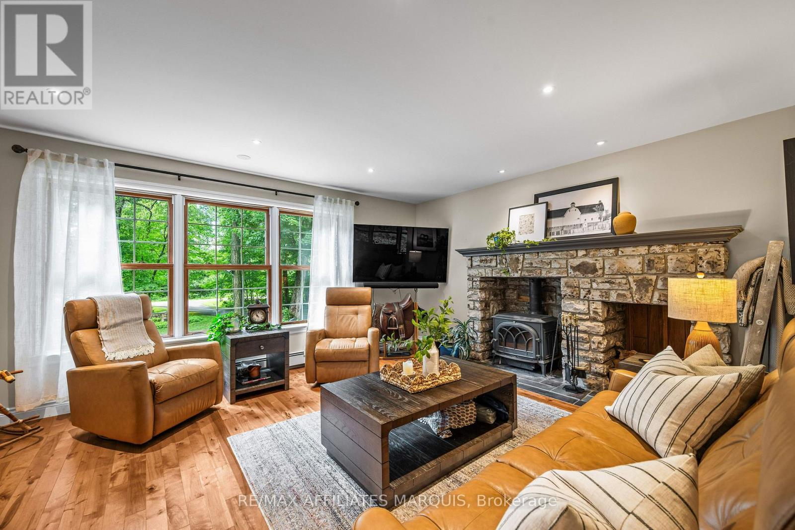 99 Old Kingston Road, Rideau Lakes, ON - Indoor Photo Showing Living Room With Fireplace