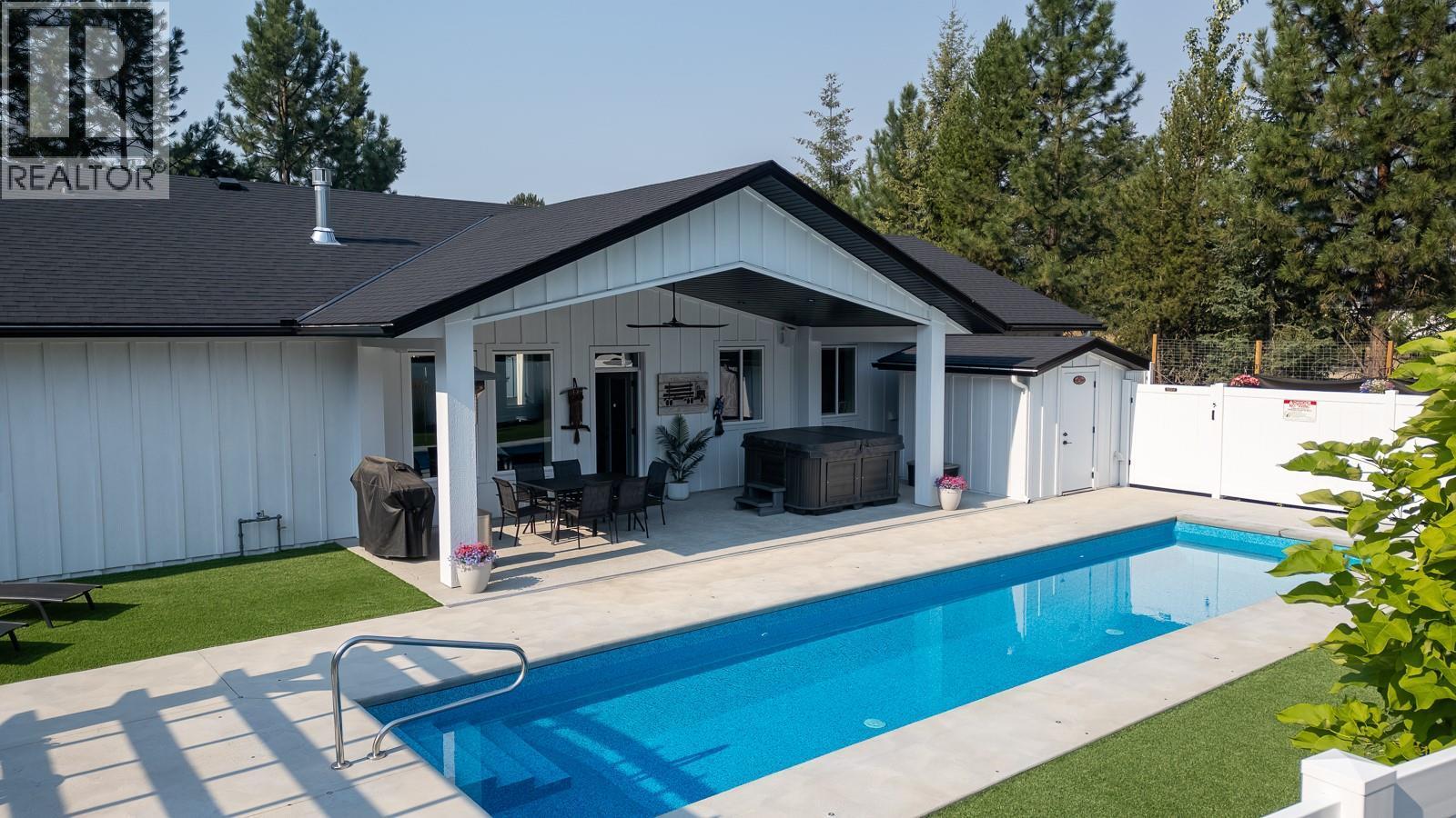 1217 Mcphee Road, Castlegar, BC - Outdoor With In Ground Pool With Deck Patio Veranda