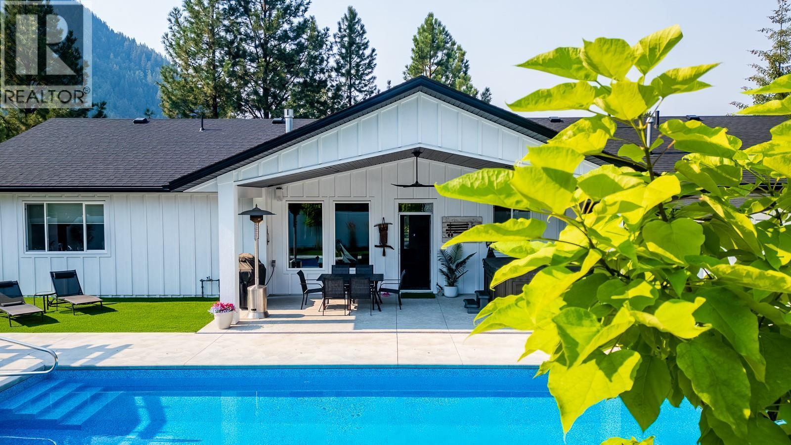 1217 Mcphee Road, Castlegar, BC - Outdoor With In Ground Pool With Deck Patio Veranda