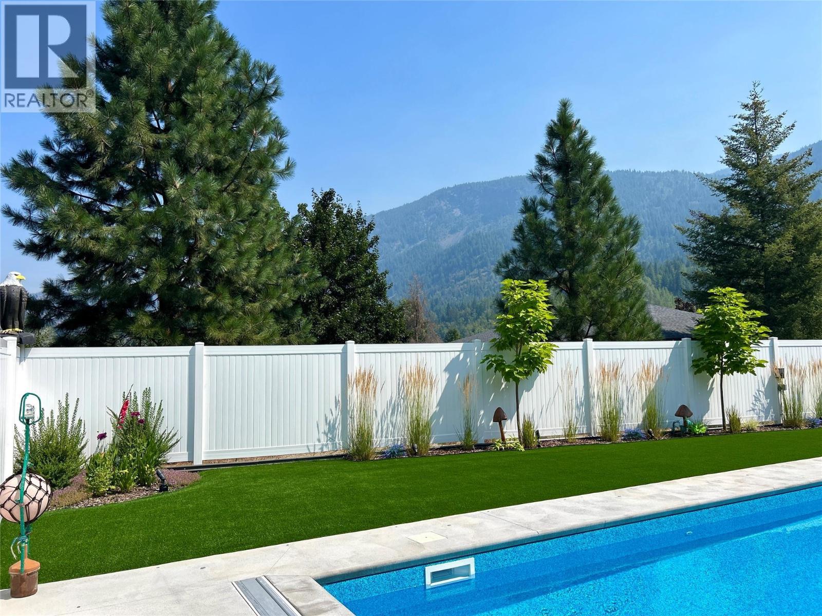1217 Mcphee Road, Castlegar, BC - Outdoor With In Ground Pool With Backyard