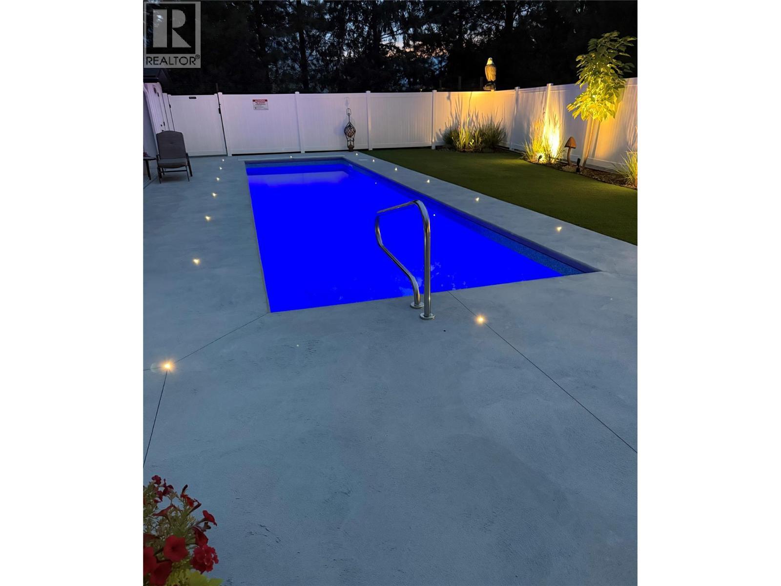 1217 Mcphee Road, Castlegar, BC - Outdoor With In Ground Pool