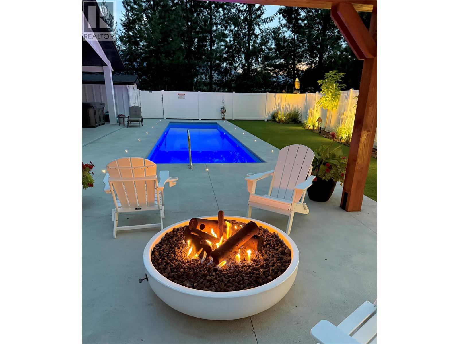 1217 Mcphee Road, Castlegar, BC - Outdoor With In Ground Pool With Backyard